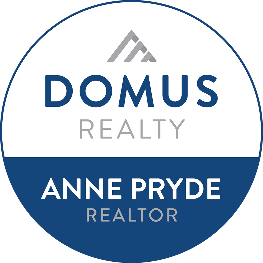 the logo of Domus Realty