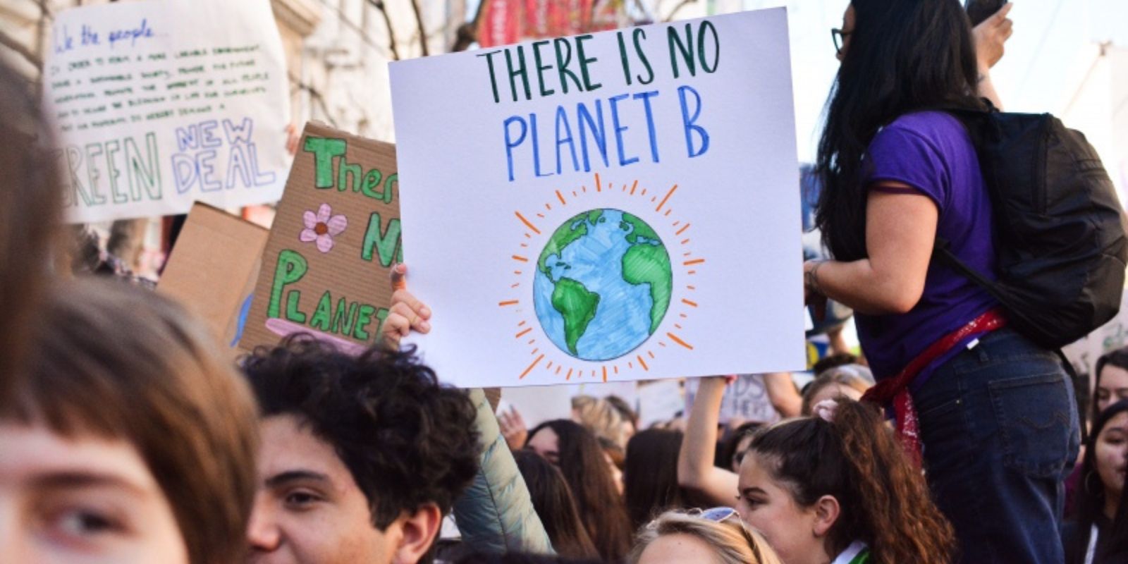 Youth in Halifax attend a climate strike. A sign can be seen in the foreground that says There's No Planet B
